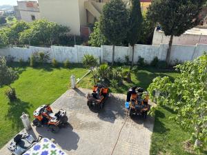 a group of motorcycles parked in a yard at Villa Meryem in Tangier