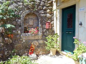A garden outside Polytropon Apartments