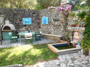 A garden outside Polytropon Apartments