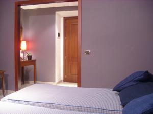 Postel nebo postele na pokoji v ubytování Hotel Taormina