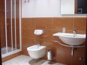 Koupelna v ubytování Hotel Taormina