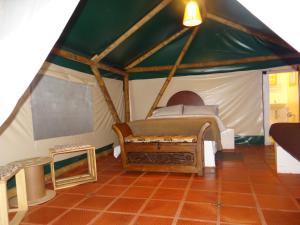 Postel nebo postele na pokoji v ubytování Glamping El Establo