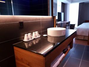Postel nebo postele na pokoji v ubytování Walden Hotel