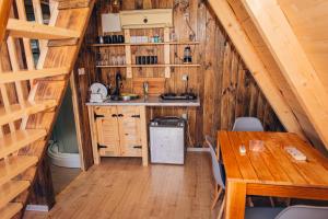 an overhead view of a kitchen in a log cabin at Mountain View 2 in Tjentište +43 photos
