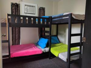 Postel nebo postele na pokoji v ubytování Anabelle Residence