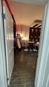 an open door to a room with a table and chairs at Luxury KIA Room B in Richmond Hill +20 photos