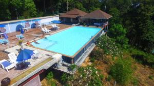 an overhead view of a large swimming pool at Koh Ngai Cliff Beach Resort in Ko Ngai