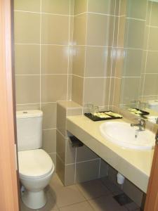 Koupelna v ubytování Linkway Hotel