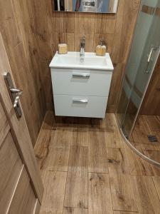 a bathroom with a sink and a shower at U Máchova jezera in Doksy +89 photos