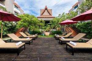 Jardí fora de Ayrest Hua Hin Hotel