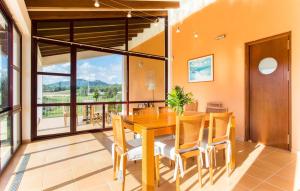 a dining room with a wooden table and chairs at Sa Font Den Ros in Son Servera +41 photos