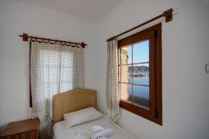 Ein Bett oder Betten in einem Zimmer der Unterkunft Baba Veli Pension