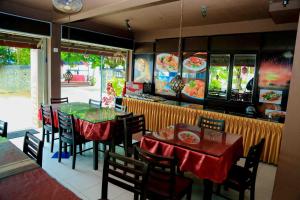 Restoranas ar kita vieta pavalgyti apgyvendinimo įstaigoje Gayana Guest House