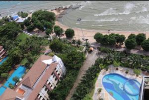 an aerial view of a resort with a swimming pool and the beach at View Talay 3 Apartment in Pattaya South