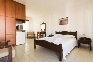 Postel nebo postele na pokoji v ubytování Hotel Melikari + 37 fotografií