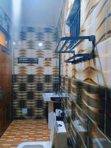 a bathroom with a sink and a toilet at KiGALI COMFORT AND CLASSIC STAY APARTMENT in Kigali +36 photos