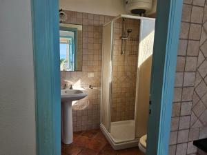 a bathroom with a shower and a sink at Villa Paradiso - spectacular sea view over volcanoes in Piano Conte +209 photos