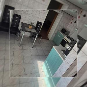 O bucătărie sau chicinetă la Master apartman +2 fotografii