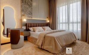a bedroom with a large bed and a mirror at Luxury Trizen Aki Apartments in Colombo +24 photos