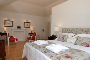 Кровать или кровати в номере Hotel Casa Palmela - Small Luxury Hotels of The World, Hotel & Villas