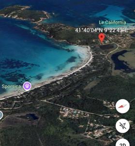 an aerial view of a beach and the ocean at Mini villa proche mer in Zonza
