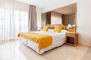 a bedroom with a large bed with a large mirror at Villa De Adeje Beach in Adeje +46 photos