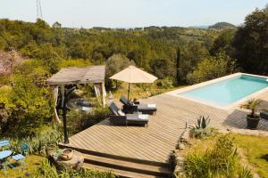 an image of a swimming pool on a house at Idyllic French farmhouse in Les Assions +21 photos