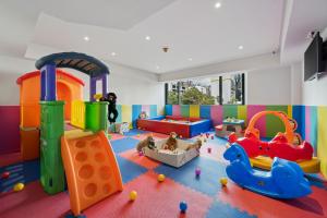 a play room with many different types of play equipment at BelAire Bangkok Sukhumvit in Bangkok