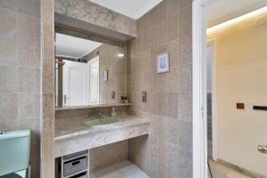 a bathroom with a sink and a mirror at Casa Mar & Golf in San Luis de Sabinillas +143 photos