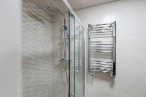 a shower with a glass door in a bathroom at Apex Studios by Derbnb in Derby +143 photos