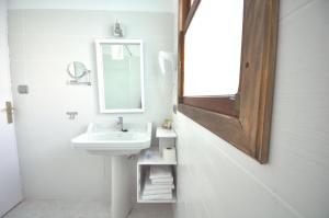 Kúpeľňa v ubytovaní Houm Villa Plaza Arosa + 37 fotografií