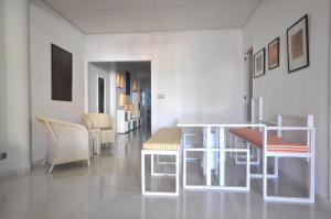Posedenie v ubytovaní Houm Villa Plaza Arosa