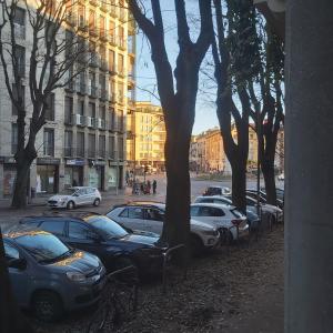 a row of cars parked in a parking lot at Civico8 in Pavia