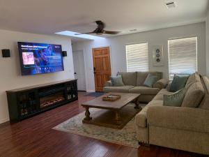 a living room with a couch and a fireplace at Walnut Grove 2BD 1Bath in Oakhurst