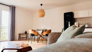 a living room with a couch and a table at House Jelka - Apartment Nina in Supetar
