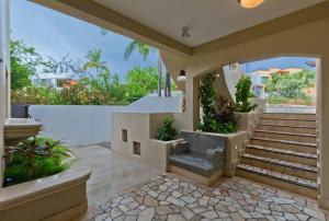 a staircase in a house with a view at Marbella lane - Stylish Private Villa OceanViews in Cabo San Lucas +76 photos