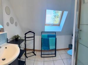 a bathroom with a sink and a window at Villa Boréas in Wissant +39 photos