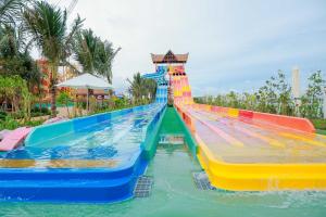 a colorful water slide at a water park at HAHA'S Villa in Binh Hai