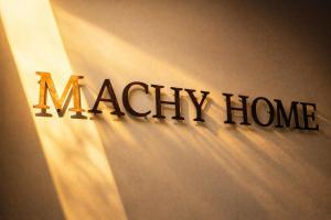 a sign for amaury house on a wall at Machy Home in Phú Quốc