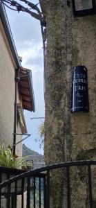 a sign for a restaurant on the side of a building at Iris in Rodio +36 photos