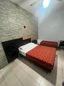 a room with a bed and a bench in it at Hotel KEY´S in Buenos Aires +14 photos