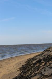 Ein Strand an oder in der Nähe der Ferienwohnung