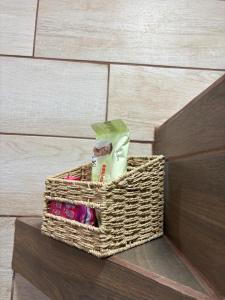 a basket sitting on top of some stairs at Apartamento #10 in Alajuela +5 photos