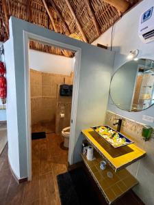 a bathroom with a sink and a toilet at Jaguar Club & Casitas in Santa Clara +47 photos