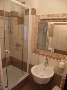 Koupelna v ubytování Hotel Milotel