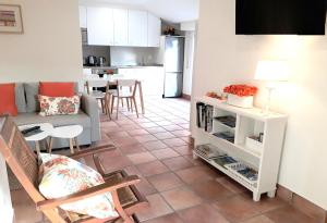 a living room with a couch and a table at alaia apartamento in Zarautz