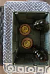 a toy house with three wooden buttons on it at Hotel Koutriaris in Distomo