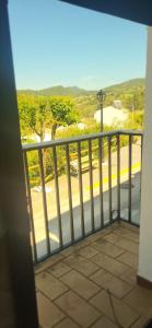 a balcony with a view of a street at Casa Los Soles in El Bosque