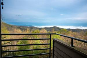 a balcony with a view of the mountains at Above the Trees - Modern Studio for 2 with Views, Wifi, Pools in Gatlinburg