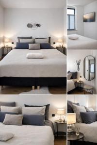 a bedroom with a large bed and a mirror at Royal Haus Chemnitz 3- Balkon nahe Zeisigwald in Chemnitz